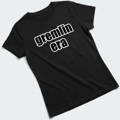 Bold text t-shirt featuring the phrase 'gremlin era' in black and white — printed on a women's shirt