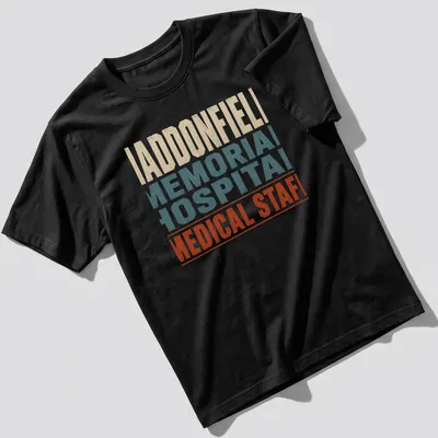 Vintage distressed Haddonfield Memorial Hospital Medical Staff t-shirt with color details — printed on a unisex t-shirt