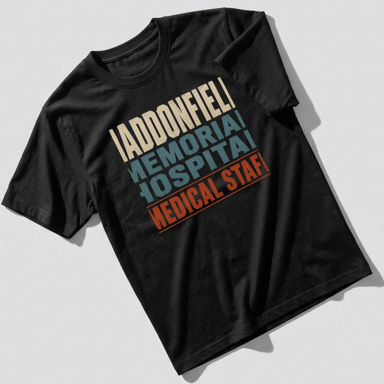 Vintage distressed Haddonfield Memorial Hospital Medical Staff t-shirt with color details — printed on a unisex t-shirt