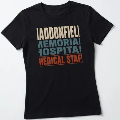 Vintage distressed Haddonfield Memorial Hospital Medical Staff t-shirt with color details — printed on a women's shirt