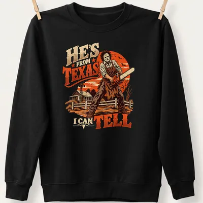 Vintage illustration of a horror character with a chainsaw and text saying He's from Texas I can tell — printed on a unisex sweatshirt