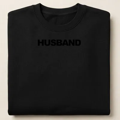 Minimal bold black HUSBAND text on a — printed on a unisex sweatshirt