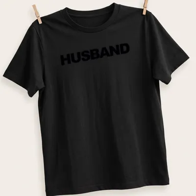 Minimal bold black HUSBAND text on a — printed on a unisex t-shirt