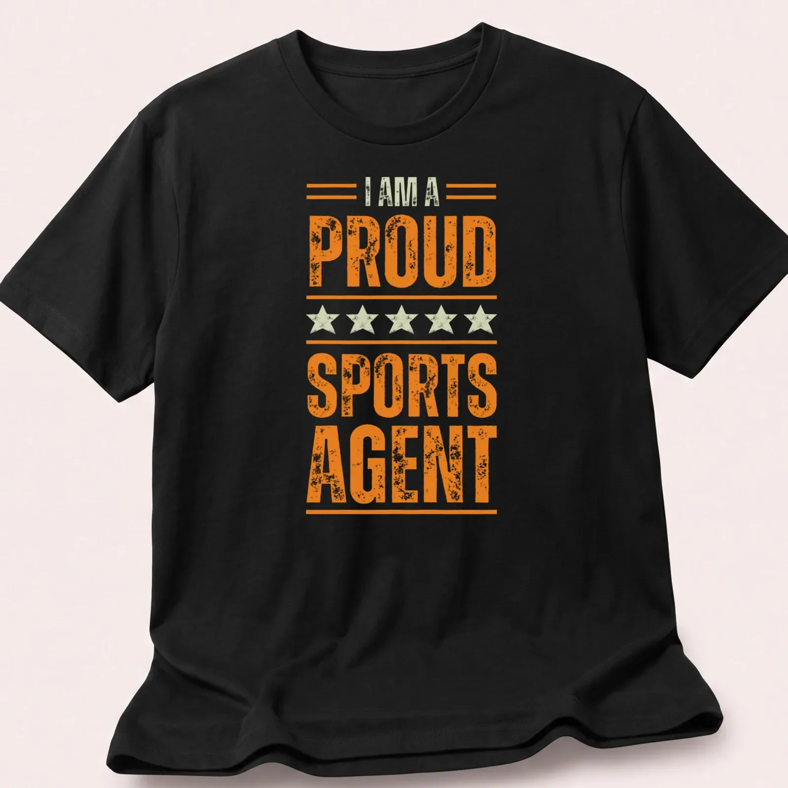Bold vintage print of the phrase 'I AM A PROUD SPORTS AGENT' in orange and cream — printed on a unisex t-shirt