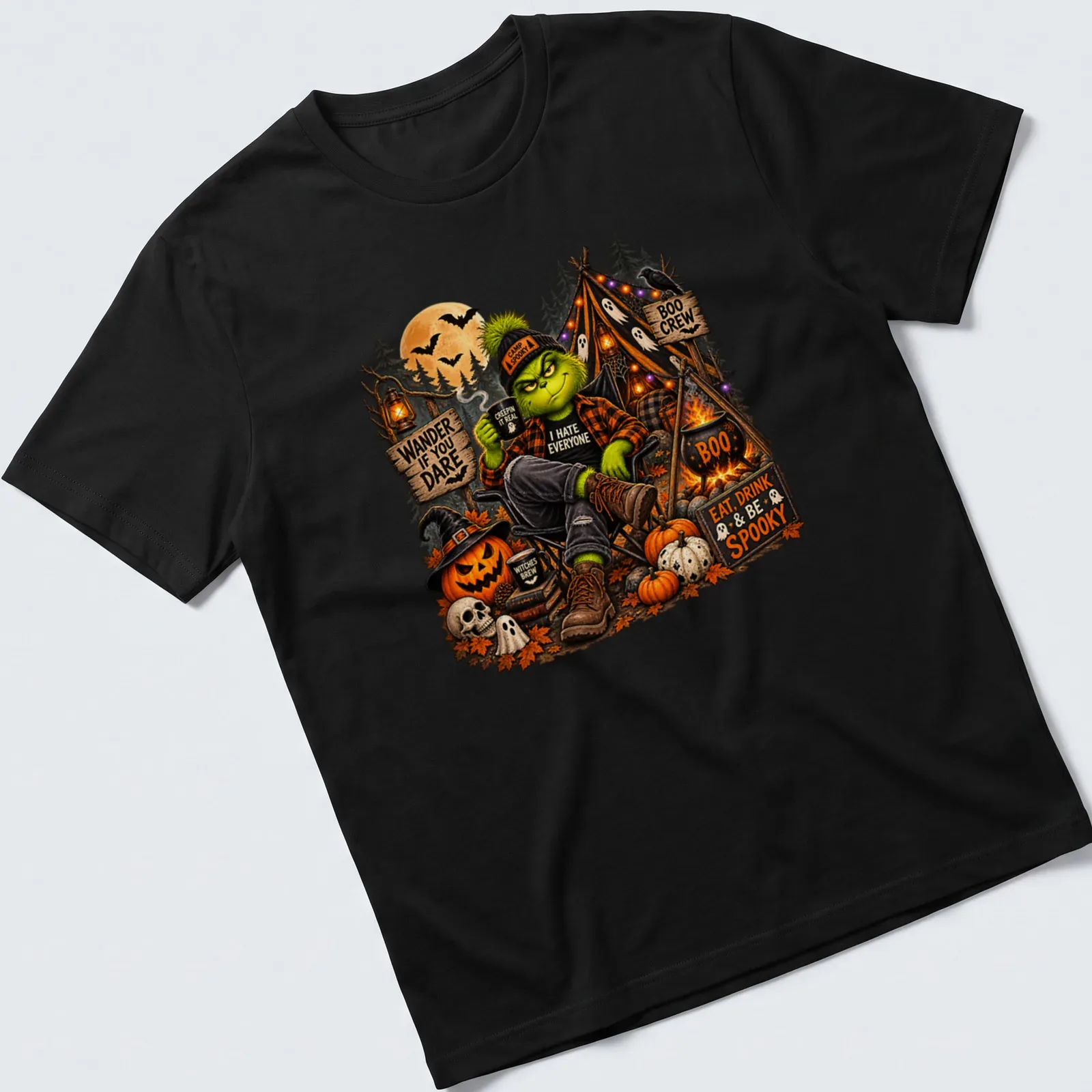 Illustration of the Grinch in camping gear with Halloween themes and text — printed on a unisex t-shirt