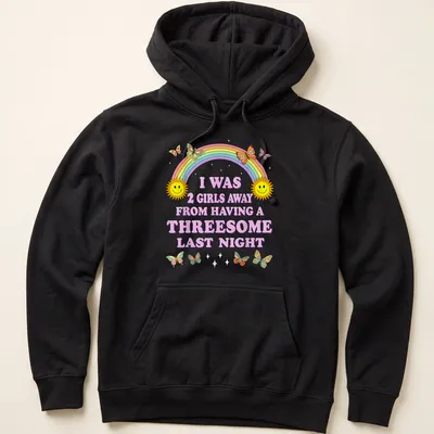 Colorful cartoon shirt with smiling suns, butterflies, and humorous text — printed on a unisex hoodie