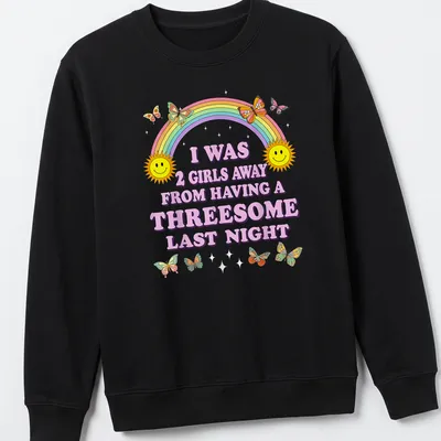 Colorful cartoon shirt with smiling suns, butterflies, and humorous text — printed on a unisex sweatshirt