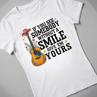 Colorful vintage design with text about smiles and an illustrated guitar — printed on a women's shirt