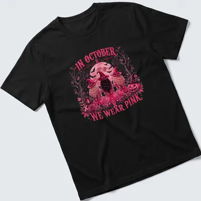 Vintage illustration of three witches with the text 'In October We Wear Pink'
