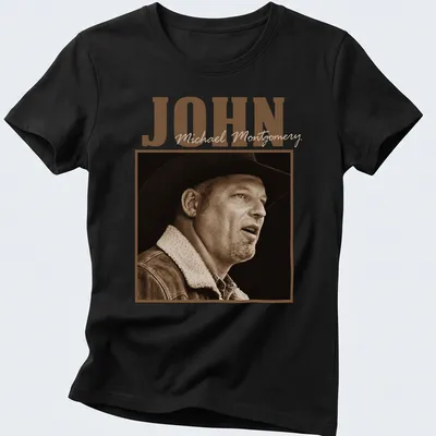 Sepia-toned cowboy portrait with John Michael Montgomery's name — printed on a women's shirt