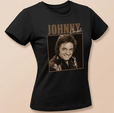 Vintage Johnny Cash t-shirt with retro font and illustration in brown and beige — printed on a women's shirt