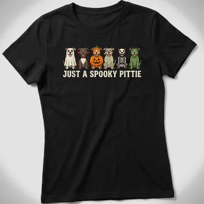 Cartoon Pitbulls in Halloween costumes with the text 'Just A Spooky Pittie' — printed on a women's shirt