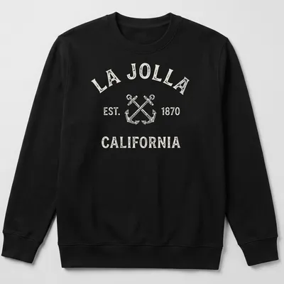 Vintage print of crossed boat anchors with La Jolla text in beige and gray. — printed on a unisex sweatshirt