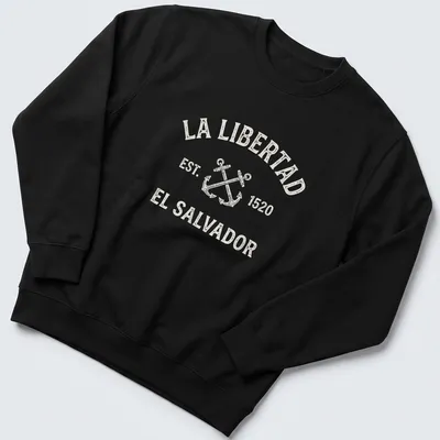 Vintage design featuring crossed anchors and text honoring La Libertad, El Salvador. — printed on a unisex sweatshirt