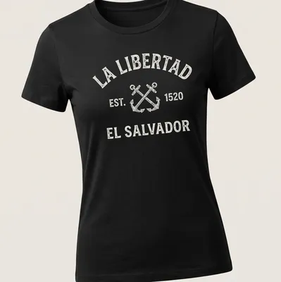 Vintage design featuring crossed anchors and text honoring La Libertad, El Salvador. — printed on a women's shirt