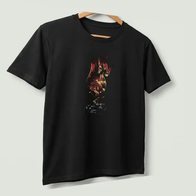 Silhouette of Lady Dimitrescu against a castle backdrop in bold colors — printed on a unisex t-shirt (angled view)