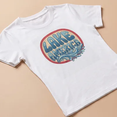 Vintage Lake America t-shirt with waves design in blue and cream — printed on a women's shirt