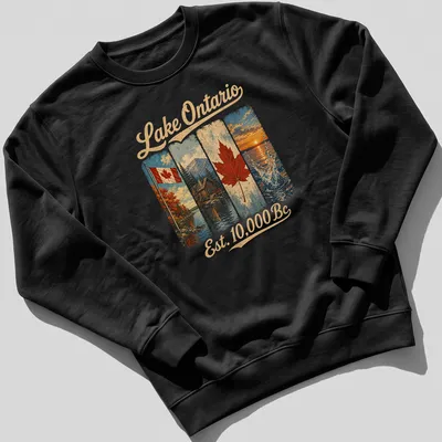 Vintage T-shirt featuring Canadian flag, cabin by lake, and maple leaf — printed on a unisex sweatshirt