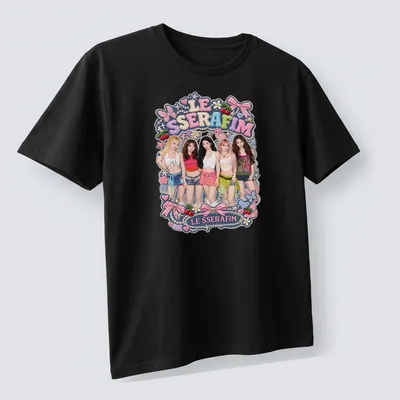 Colorful graphic t-shirt featuring LE SSERAFIM performers in playful illustrations — printed on a unisex t-shirt (angled view)