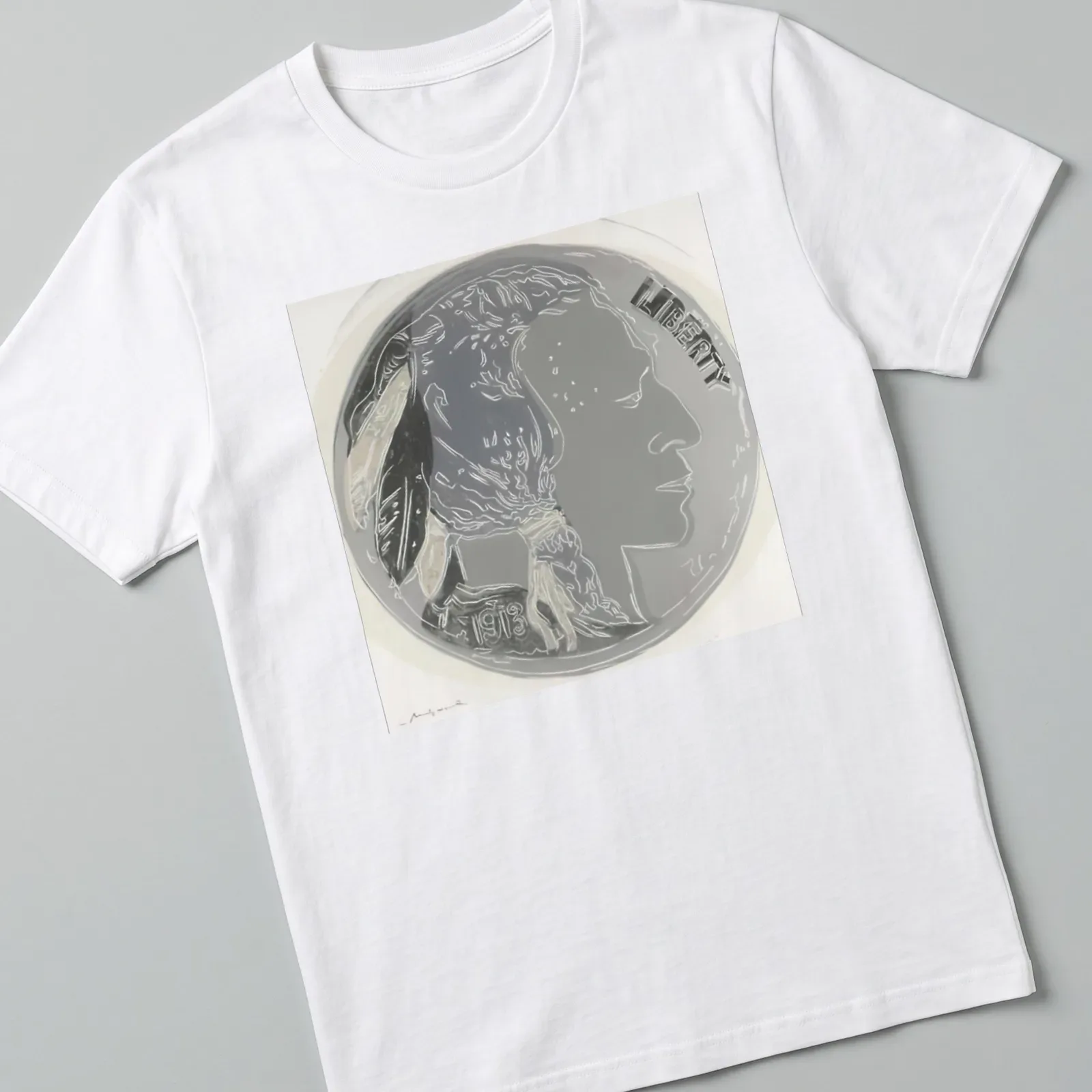 Andy Warhol's design of an Indian Head Nickel with Liberty 1913 text in black and silver — printed on a unisex t-shirt