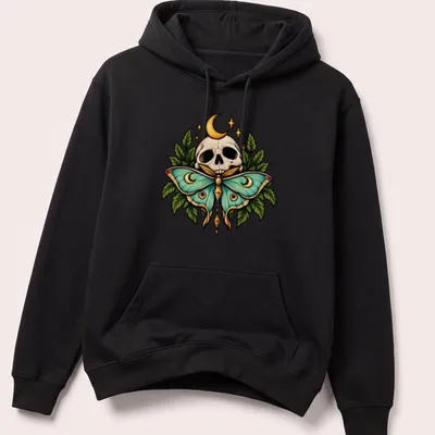 Gothic botanical print of a skull and moth with Moon Moth text in green and gold — printed on a unisex hoodie