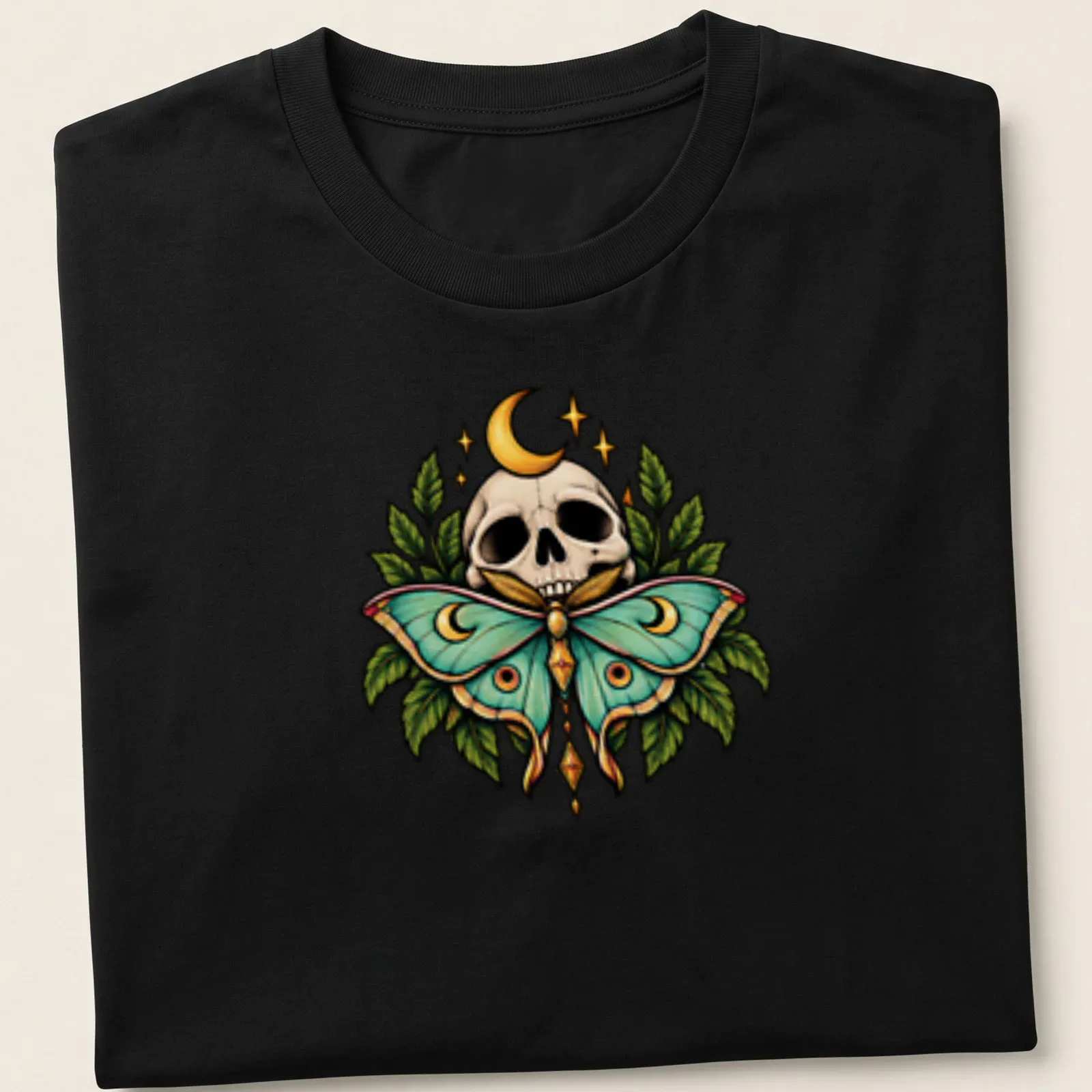 Gothic botanical print of a skull and moth with Moon Moth text in green and gold — printed on a unisex t-shirt
