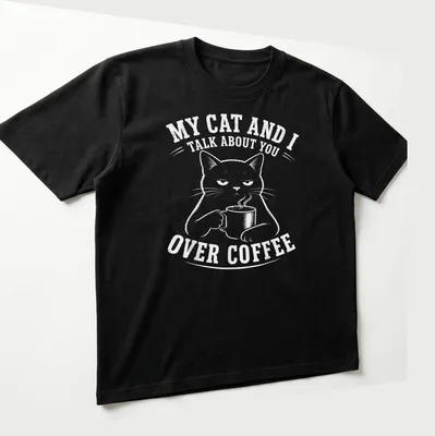 Humorous black cat t-shirt featuring a meme about coffee conversations — printed on a unisex t-shirt (angled view)