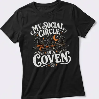 Whimsical design featuring witch hats with the text My Social Circle Is A Coven — printed on a women's shirt