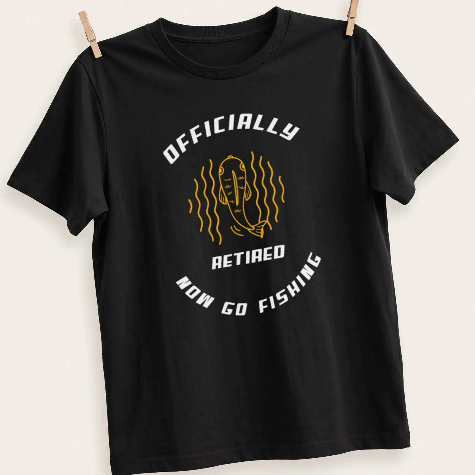 Line-art fish graphic with humorous retirement text in yellow — printed on a unisex t-shirt