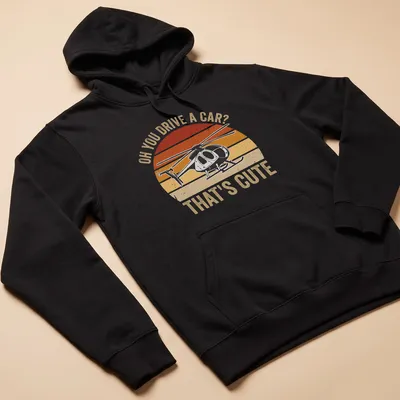 Retro distressed T-shirt with sarcastic text and helicopter graphic in orange and cream — printed on a unisex hoodie