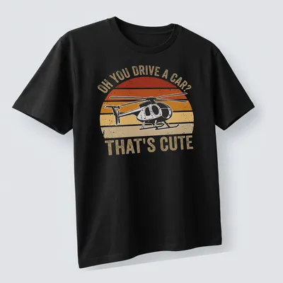 Retro distressed T-shirt with sarcastic text and helicopter graphic in orange and cream — printed on a unisex t-shirt (angled view)