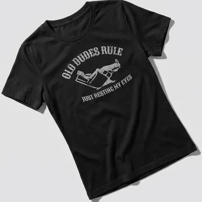Vintage distressed t-shirt with a reclining man and humorous text about resting eyes — printed on a women's shirt