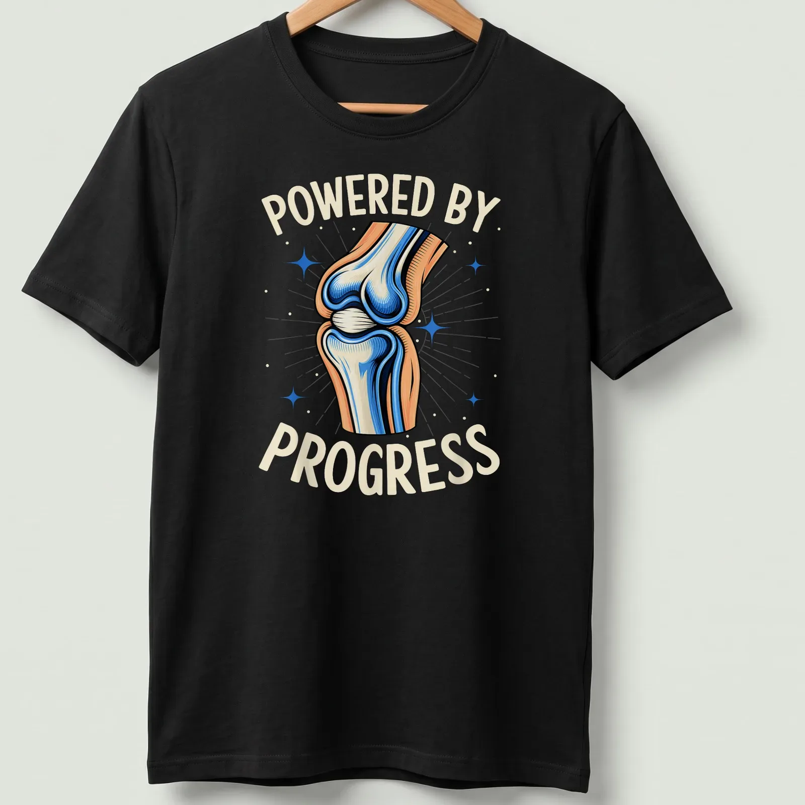 Vibrant illustration of a knee joint with motivational text on a t-shirt. — printed on a unisex t-shirt
