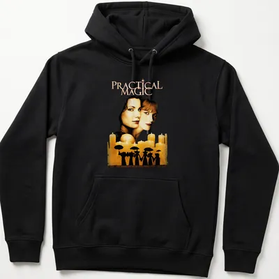 Vintage movie poster style t-shirt featuring two women with umbrellas and the text 'Practical Magic' — printed on a unisex hoodie