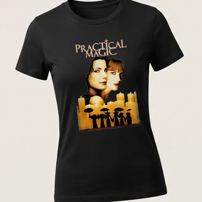 Vintage movie poster style t-shirt featuring two women with umbrellas and the text 'Practical Magic' — printed on a women's shirt