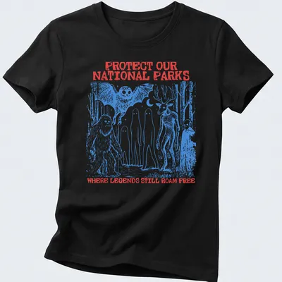 Vintage illustration of Bigfoot, aliens, and text about protecting national parks. — printed on a women's shirt