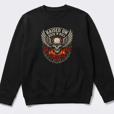 Bold vintage graphic of a winged skull entwined with roses and text RAISED ON ROCK 'N' ROLL — printed on a unisex sweatshirt