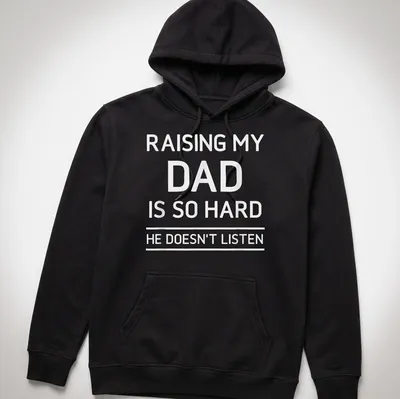 Bold typography humorous T-shirt about raising a dad who doesn't listen — printed on a unisex hoodie