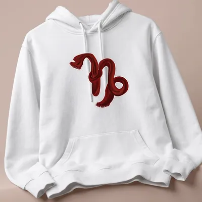 Illustration of the Capricorn symbol created with a red scarf on a — printed on a unisex hoodie