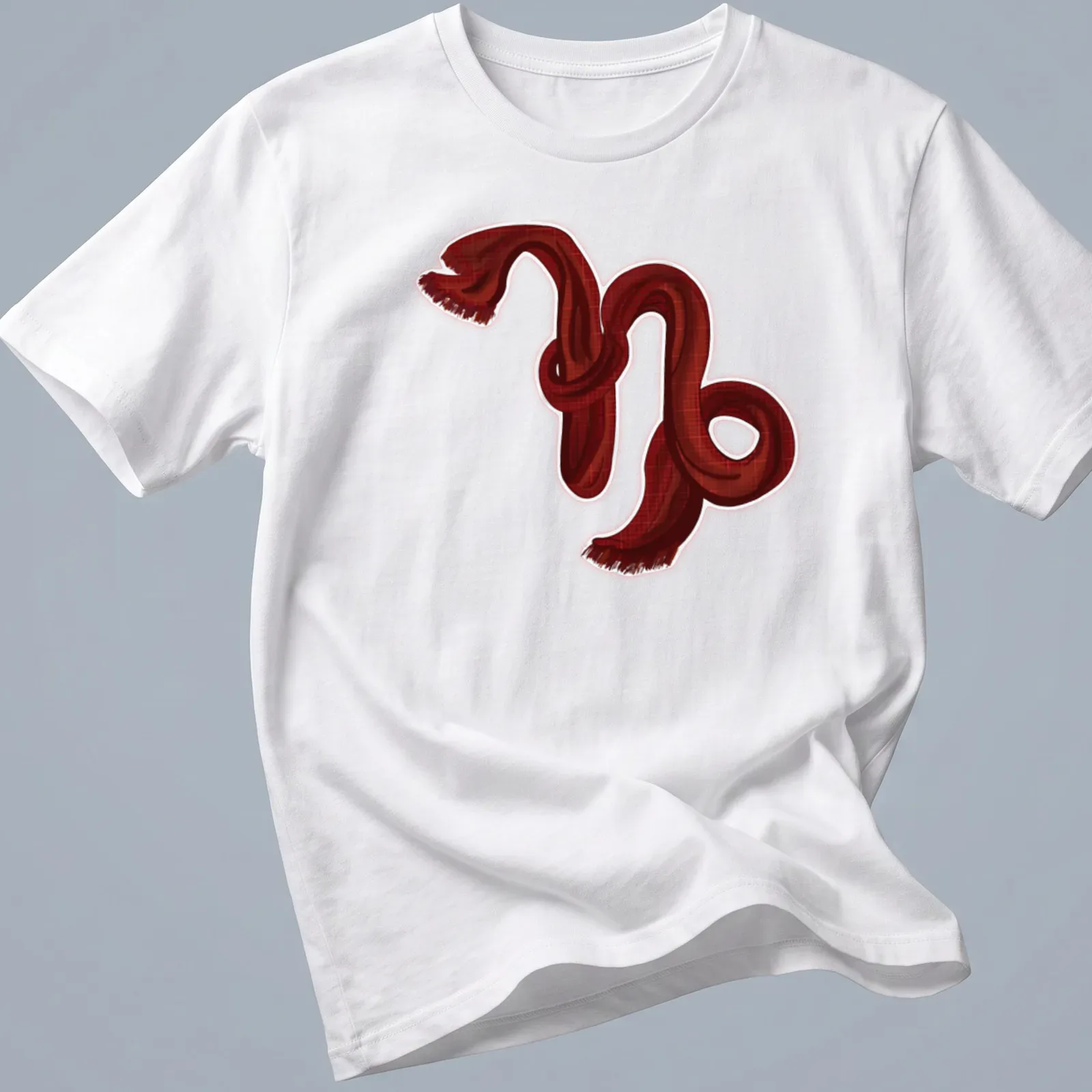 Illustration of the Capricorn symbol created with a red scarf on a — printed on a unisex t-shirt