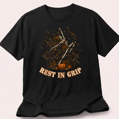 Illustrative t-shirt featuring a skeleton aerialist with Halloween elements in various colors