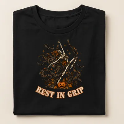 Illustrative t-shirt featuring a skeleton aerialist with Halloween elements in various colors — printed on a women's shirt