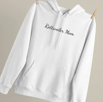 Script design reading Rottweiler Mom in black on white — printed on a unisex hoodie