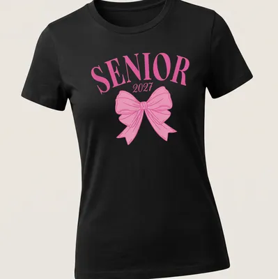 Aesthetic graduation t-shirt with SENIOR 2027 text and a pink bow — printed on a women's shirt