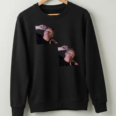 Photographic style print of a man with glasses in black, gray, and brown — printed on a unisex sweatshirt