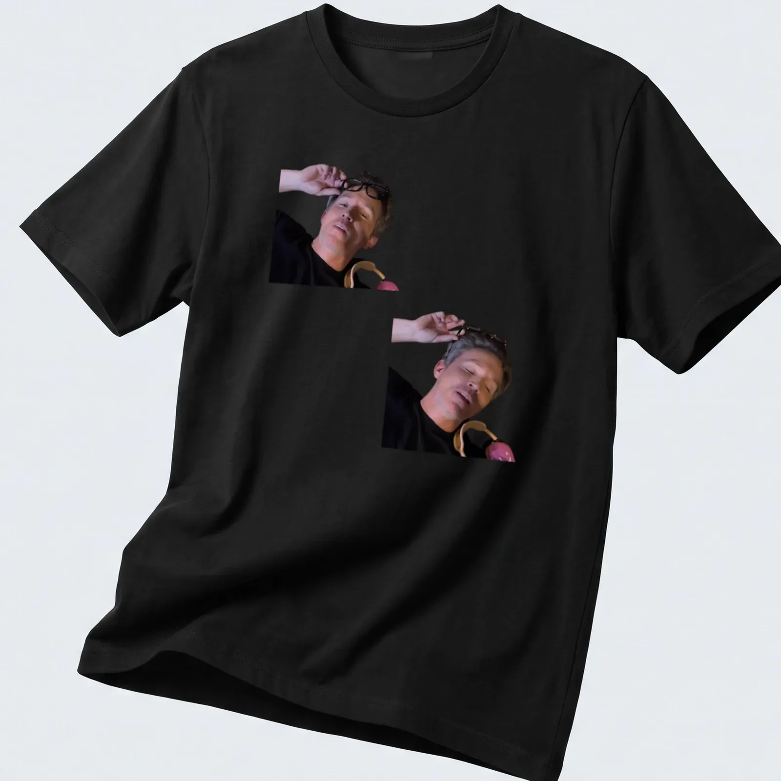 Photographic style print of a man with glasses in black, gray, and brown — printed on a unisex t-shirt