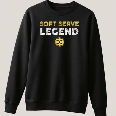 Distressed retro design featuring 'Soft Serve Legend' with a yellow pickleball. — printed on a unisex sweatshirt