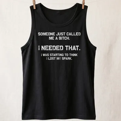 Bold motivational phrase t-shirt with distressed typography in black and white — printed on a tank top
