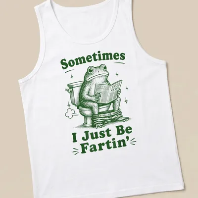 Vintage illustration of a frog reading Daily Toad Frog News with humorous text — printed on a tank top