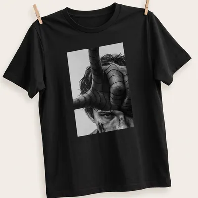 Realistic portrait of Tom Holland as Spider Man in black, white, and gray — printed on a unisex t-shirt